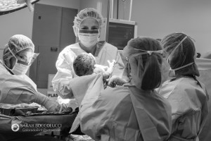 Colorado Birth Photography Doctor holding baby